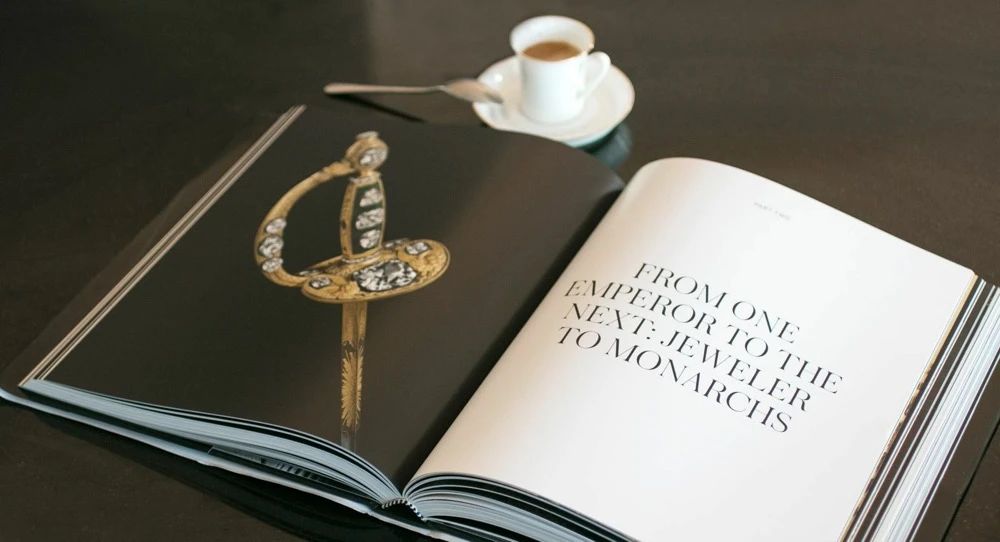 a cup of coffe and a sword in book